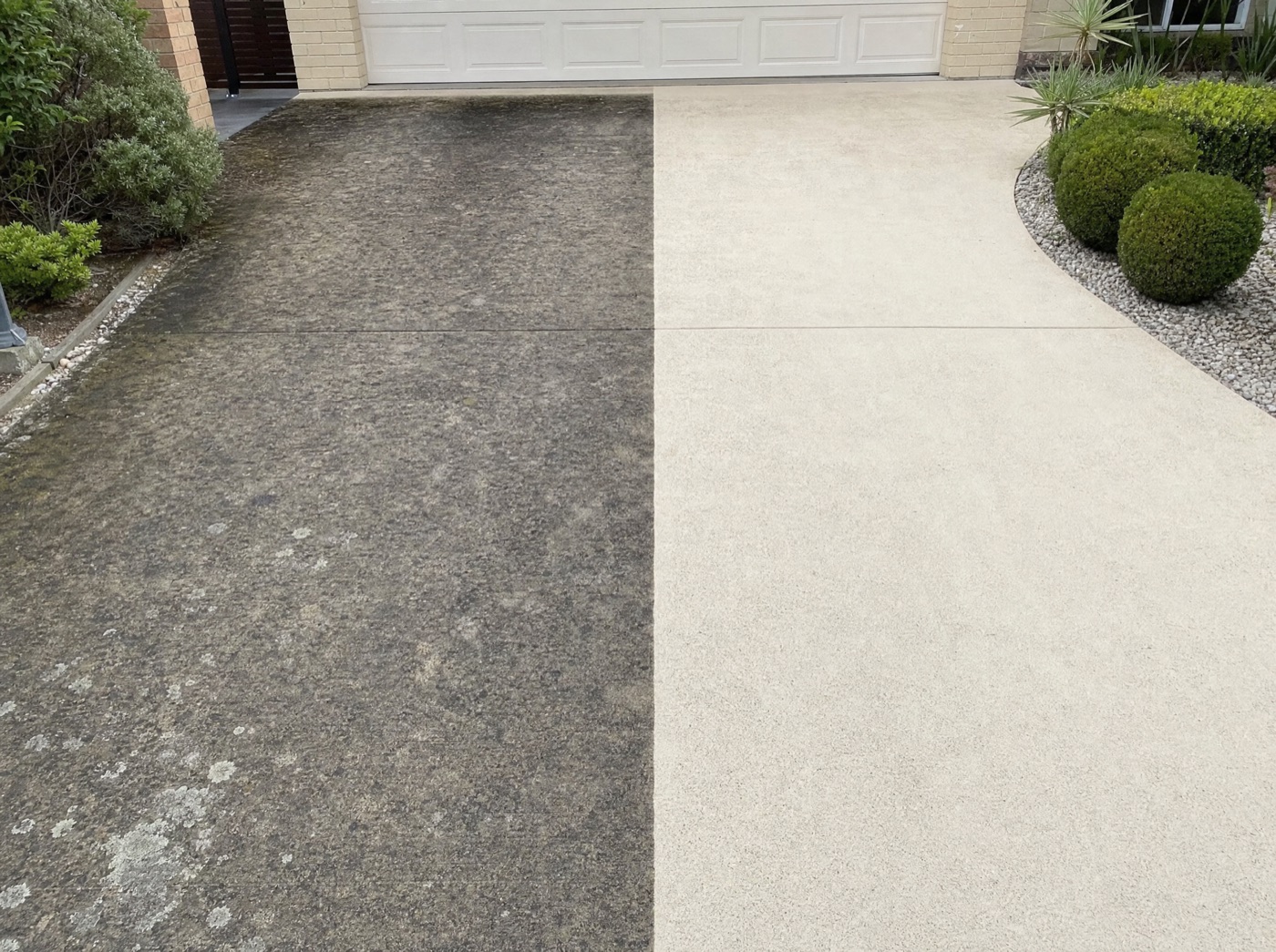 Driveway before and after pressure cleaning